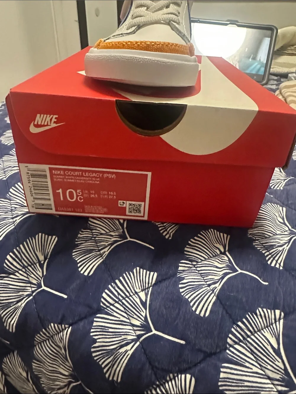 Nike Kids White Sneaker with Blue Swoosh and Purple Lining